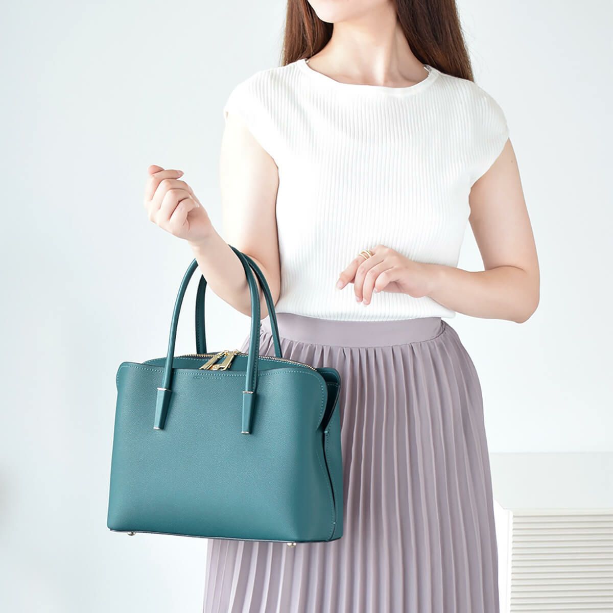 レザー 3コンパートメント丸ハンドルレディースハンドバッグ